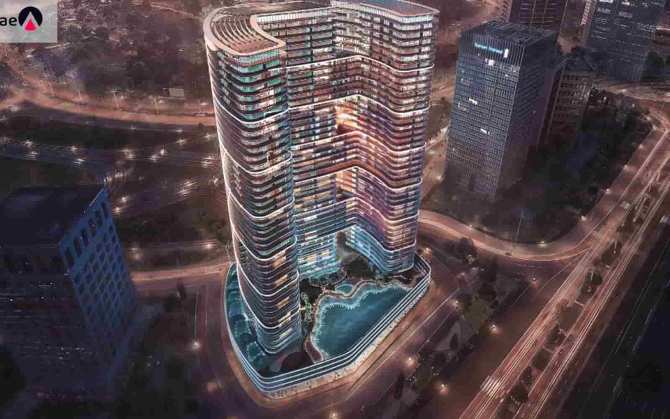 The beautiful Binghatti Hills tower at night to buy a house in Dubai