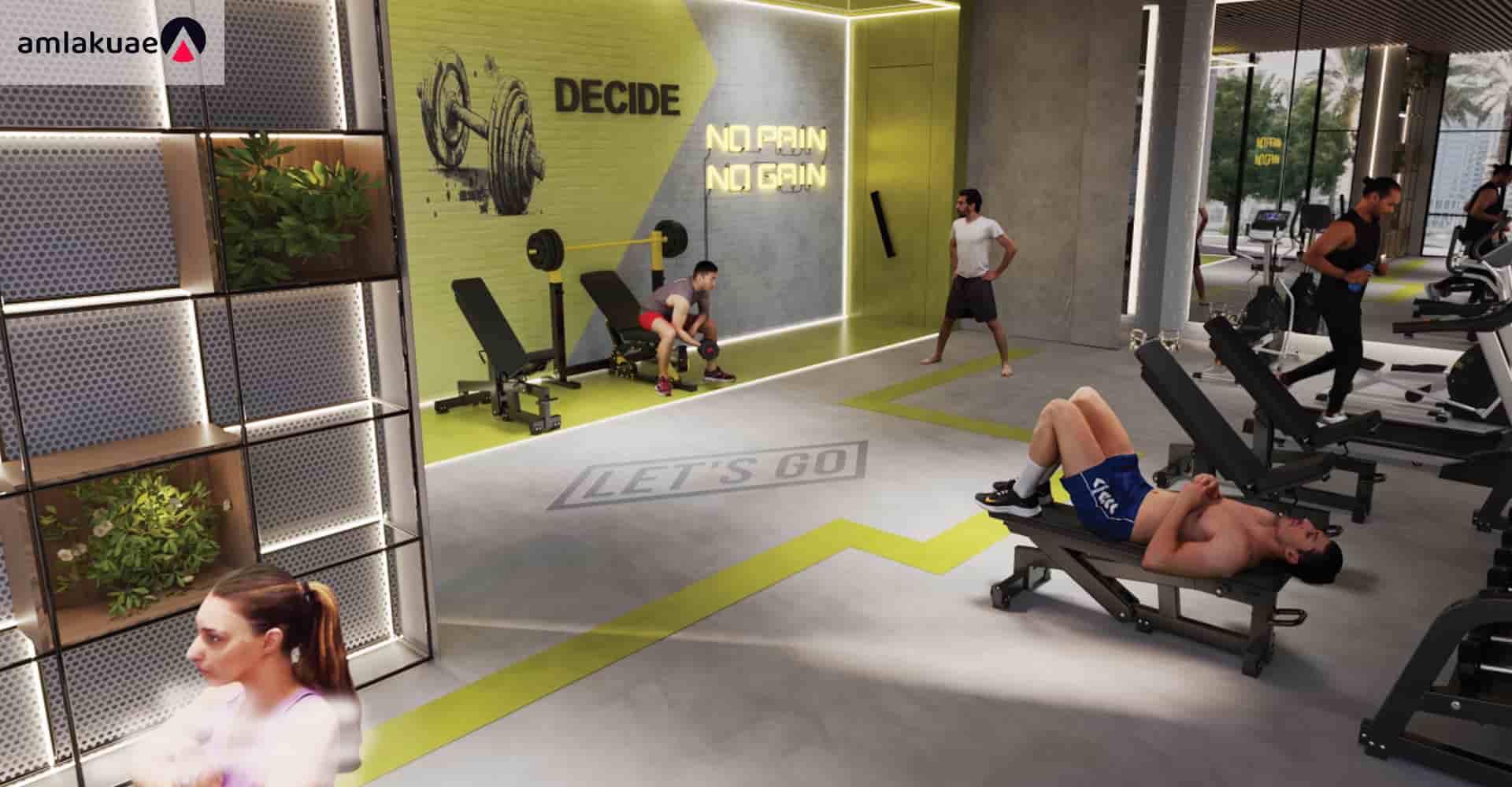 The fitness club in the Samana Lake Views residential community for purchasing a home in Dubai - Amlakuae Group