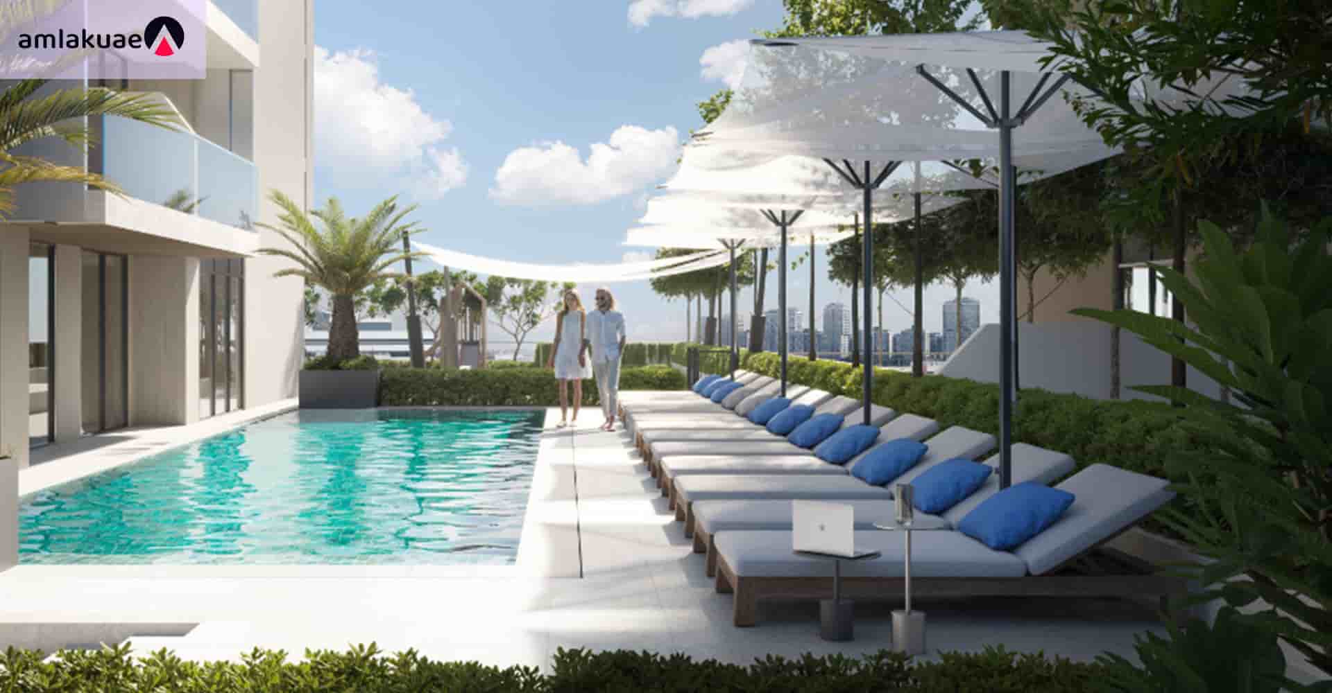 Pool and sunbathing facilities at Luminar apartments in JVT - Amlakuae Group